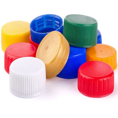 Plastic caps and closures produced using injection moulding